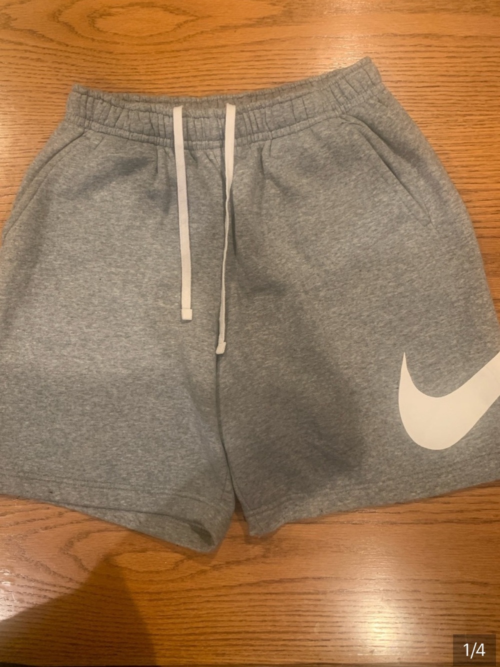 Nike Women's Heather Gray Athletic Shorts with White Swoosh